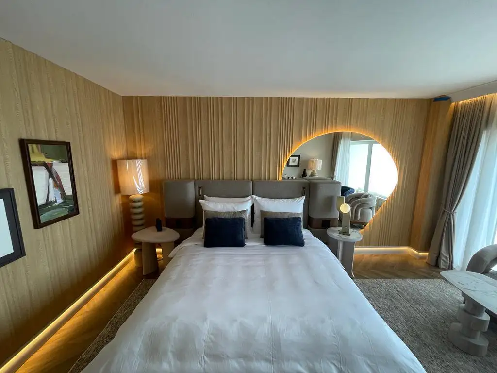 Bedroom with warm wall finishes